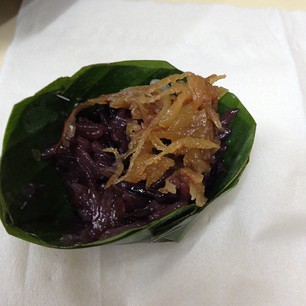 roasted coconut & sticky rice inside a banana leaf